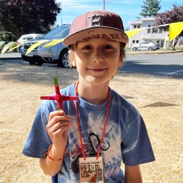 A camper with his God’s eye. Photo by Ruth MacIntosh.